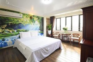 Phòng Deluxe Giường Đôi Có Ban Công (Deluxe Double Room with Balcony)
