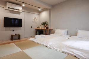 Phòng 2 Giường Đơn Với Phòng Tắm Riêng (Twin Room with Private Bathroom)