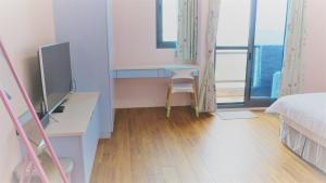 Phòng Deluxe Giường Đôi Với Ban Công và Tầm Nhìn Ra Biển (Deluxe Double Room with Balcony and Sea View)