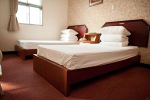 Phòng 2 Giường Đơn Hạng Bình Dân (Budget Twin Room)