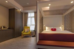 Phòng Có Giường Cỡ Queen Với Ban Công (Queen Room with Balcony)