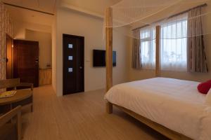 Phòng Có Giường Cỡ Queen Với Ban Công (Queen Room with Balcony)
