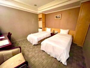 Phòng Tiết kiệm 2 giường Không hút thuốc (Economy Twin Non-Smoking)