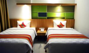 Phòng Hai Giường Đơn Loại Sang (Deluxe Twin Room)