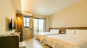 Phòng 4 Người Có Ban Công (Quadruple Room with Balcony)