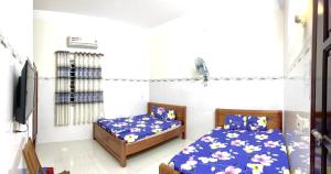 Phòng Bốn Người Có Phòng Tắm Riêng (Quadruple Room with Private Bathroom)