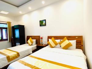 Phòng Tiêu chuẩn 3 người (1 giường đôi và 1 giường đơn) (Standard Triple (1 Double Bed And 1 Single Bed))
