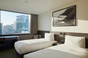 Phòng Hai Giường Đơn Loại Sang (Deluxe Twin Room)