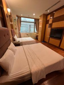 Phòng Bốn Người Có Gara (Quadruple Room with Garage)