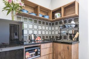 Căn Hộ - Tầng Trệt (Apartment - Ground Floor)