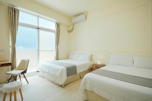 Phòng 4 Người Có Ban Công (Quadruple Room with Balcony)