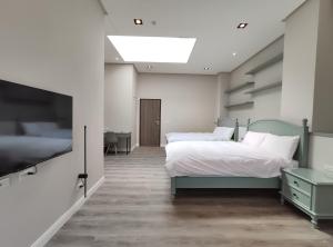 Phòng Deluxe 4 Người (Deluxe Quadruple Room)