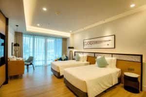 Deluxe 2 giường Hướng phố (Deluxe Twin City View)