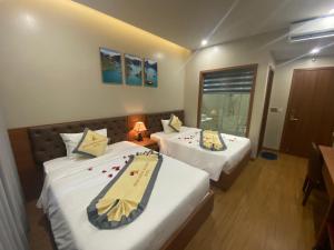 Phòng Deluxe Có 2 Giường Cỡ Queen (Deluxe Queen Room with Two Queen Beds)
