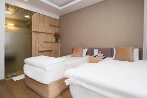 Phòng Hai Giường Đơn Loại Sang (Deluxe Twin Room)