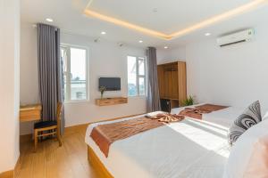 Phòng Deluxe Có 2 Giường Cỡ Queen (Deluxe Queen Room with Two Queen Beds)