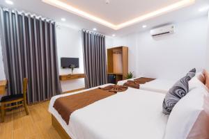 Phòng Deluxe Có 2 Giường Cỡ Queen (Deluxe Queen Room with Two Queen Beds)