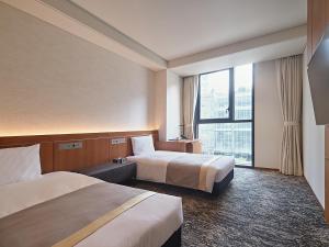 Phòng Hollywood 2 Giường Đơn - Phù Hợp Cho Xe Lăn (Hollywood Twin Accessible Room - Wheelchair Accessible)
