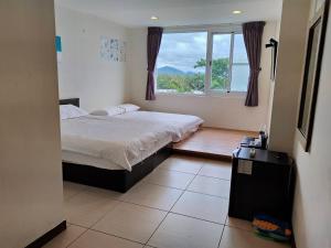 Phòng Deluxe 4 Người (Deluxe Quadruple Room)
