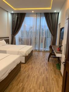 Phòng 4 Người Có Ban Công (Quadruple Room with Balcony)