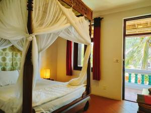 Phòng Tiêu Chuẩn Hướng Bể Bơi Hoặc Vườn (Standard Garden or Pool View Room)