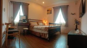 Phòng Giường Đôi Nhìn Ra Vườn (Double Room with Garden View)