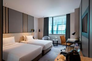 Phòng Hai Giường Đơn Loại Sang (Deluxe Twin Room)