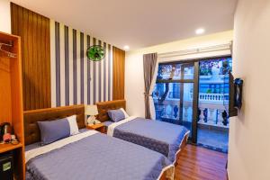 Phòng 2 giường đơn có ban công (Twin Room with Balcony)