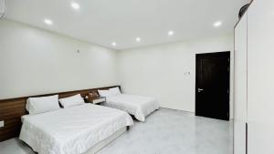 Phòng Deluxe Giường Đôi/2 Giường Đơn (Deluxe Double or Twin Room)