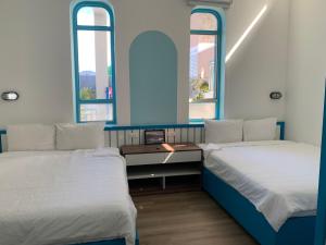Phòng Tập Thể (Dormitory Room)