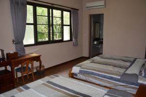 Phòng Tiêu Chuẩn Có 2 Giường Cỡ Queen (Standard Queen Room with Two Queen Beds)
