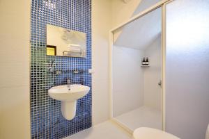 Phòng Bốn Người Có Phòng Tắm Riêng (Quadruple Room with Private Bathroom)