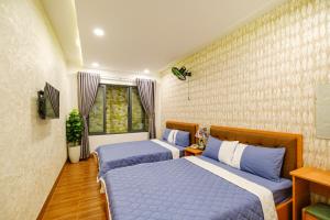 Phòng Tiêu Chuẩn 4 Người (Standard Quadruple Room)
