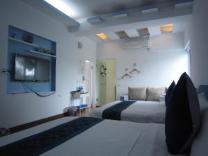 Phòng 4 Người Có Phòng Tắm (Quadruple Room with Bathroom)