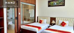 Phòng Hai Giường Đơn Loại Sang (Deluxe Twin Room)