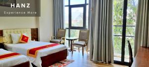 Phòng Hai Giường Đơn Loại Sang (Deluxe Twin Room)