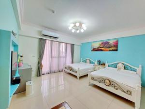Phòng Deluxe 4 Người (Deluxe Quadruple Room)