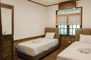 Phòng Hai Giường Đơn – Một Người Sử Dụng (Twin Room - Single Use)