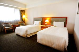 Phòng Superior A 2 giường có bồn tắm riêng (Superior Twin Room A with Private Bathtub)