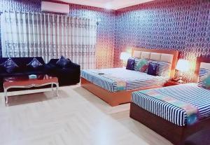 Family Suite room in Hotel Versa Appartments lodges Gulberg3