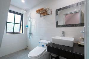 Phòng Hai Giường Đơn Loại Sang (Deluxe Twin Room)