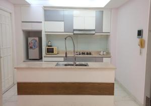 Căn Hộ Deluxe 3 Phòng Ngủ (Deluxe Three-Bedroom Apartment)