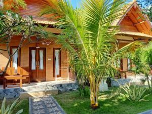 Phòng Deluxe giường đôi Hướng vườn (Deluxe Double Room Garden View)