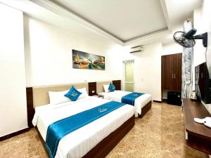 Phòng Deluxe Giường Đôi/2 Giường Đơn (Deluxe Double or Twin Room)
