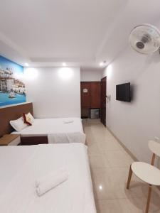 Phòng Hạng Tiết kiệm Cho 4 Người (Economy Quadruple Room)