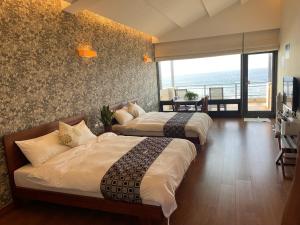 Phòng 4 Người Nhìn Ra Biển (Quadruple Room with Sea View)