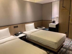 Phòng Hai Giường Đơn Tiêu Chuẩn không có Cửa Sổ (Standard Twin Room without Window)
