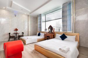 Phòng Hai Giường Đơn Loại Sang (Deluxe Twin Room)