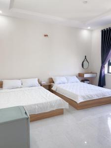 Phòng Bốn Người Có Phòng Tắm Riêng (Quadruple Room with Private Bathroom)