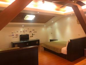 Phòng gia đình với phòng tắm riêng. (Family Room with Private Bathroom)